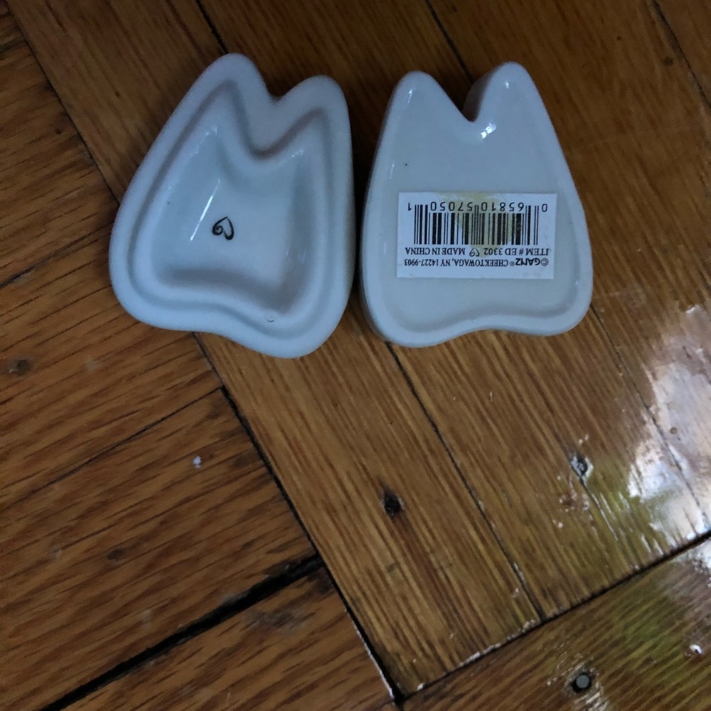 A set of 3 Ceramic baby tooth holder